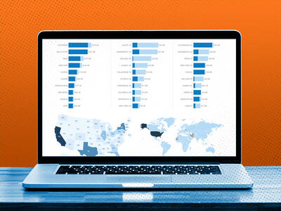 laptop with icon of the United States map and data